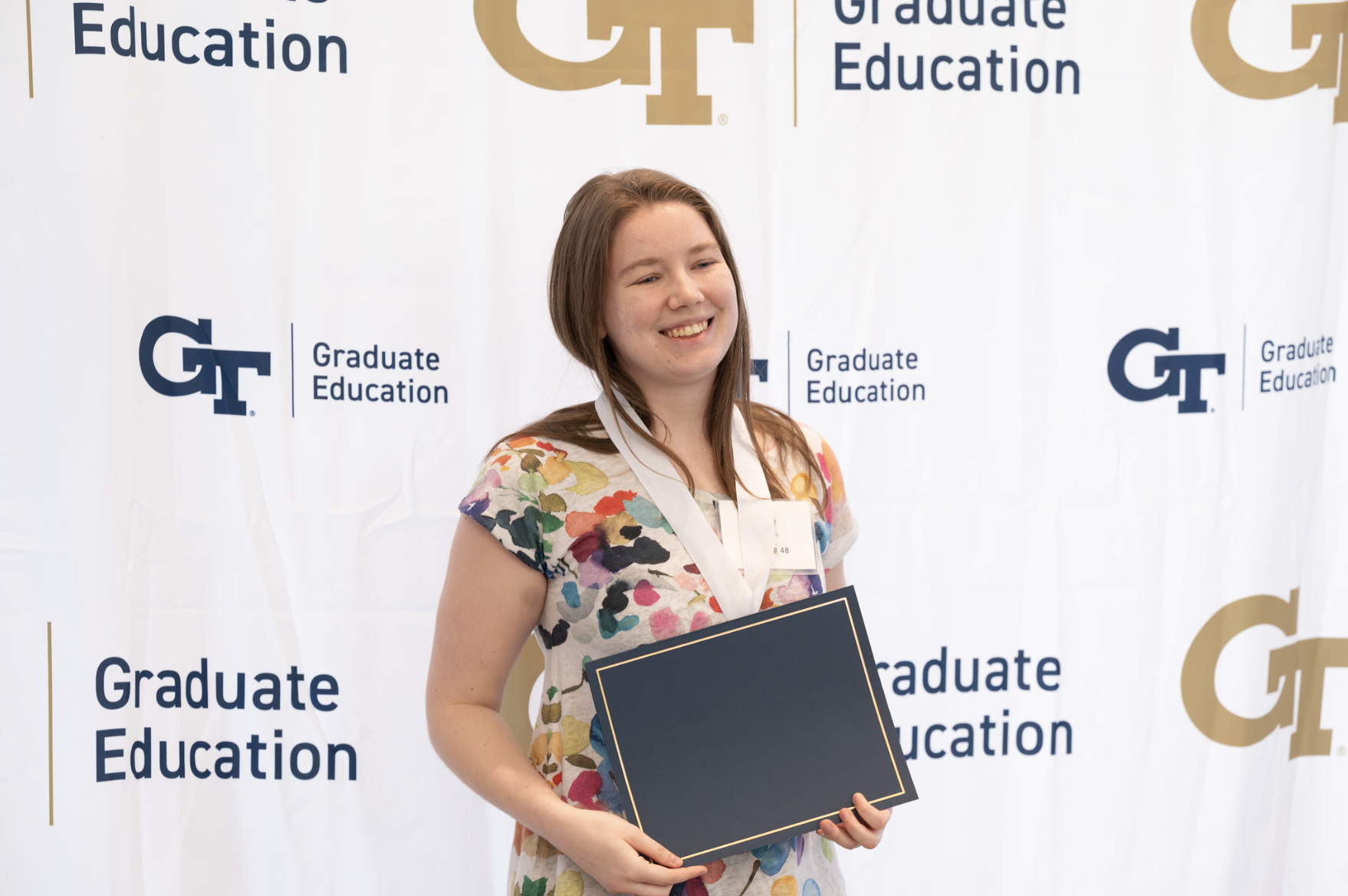 Chloe LeCates celebrates an award at CRIDC 2024.